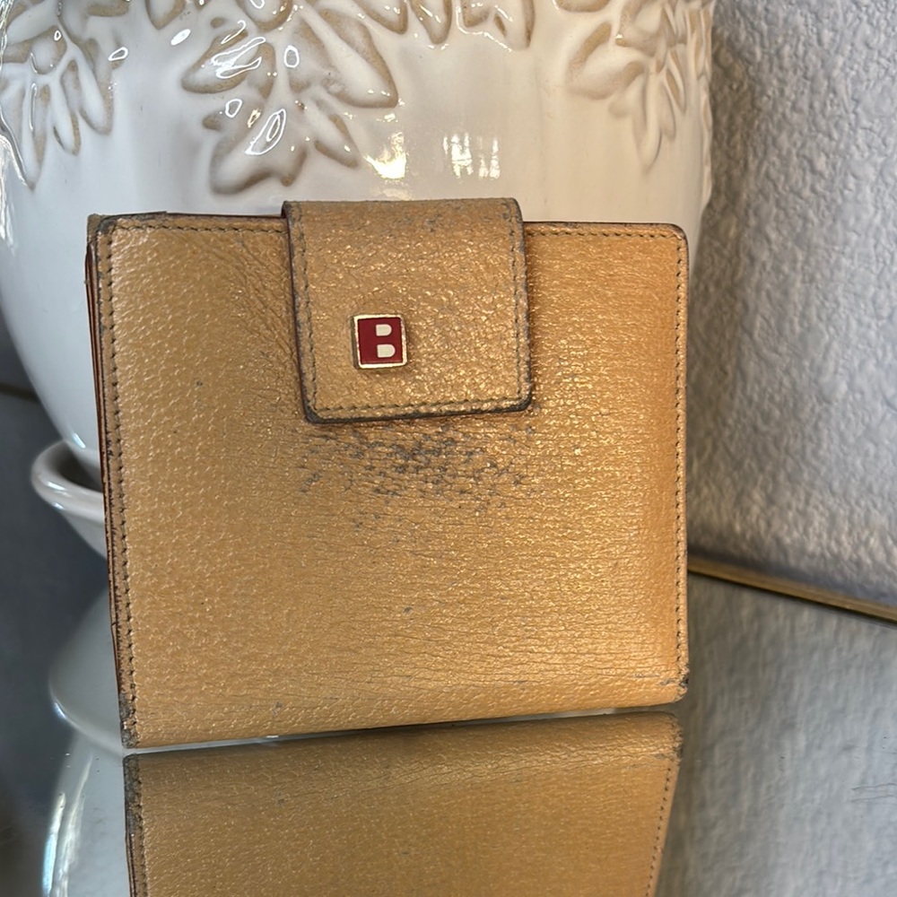 Bally Gold Leather Wallet. With wear